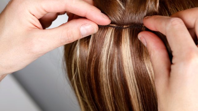 putting in hair extensions
