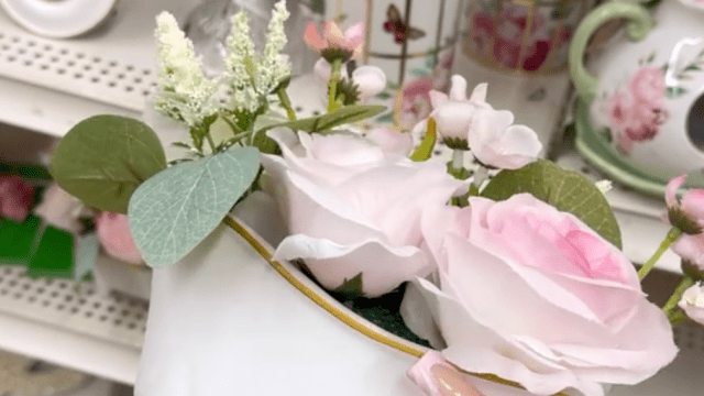 Display of pink and white home decor at Michaels