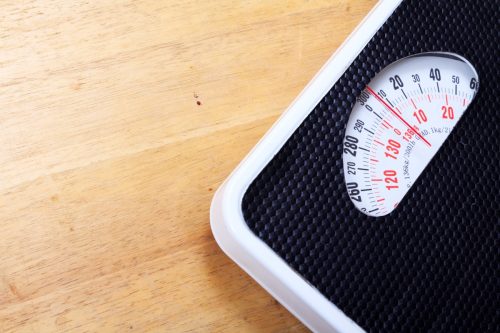scale on hardwood floor