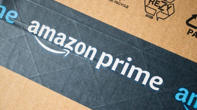 A close up of branded box tape that says Amazon Prime