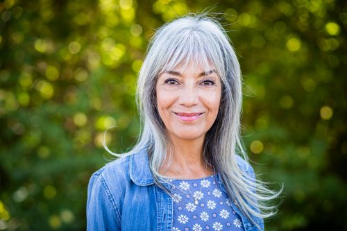older woman with bangs and grey hair
