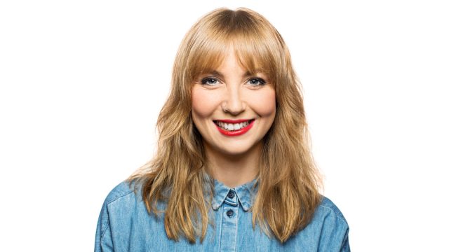 Woman blonde hair denim shirt