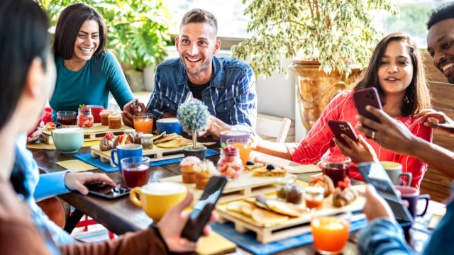 Group of friends enjoying outdoor brunch together