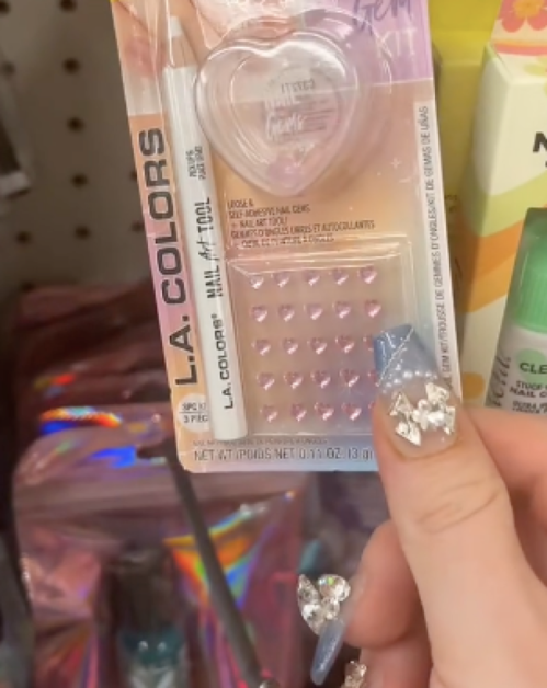 still from TikTok showing Dollar Tree nail gems