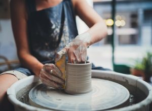 cropped photo of a woman participating in a ceramics class