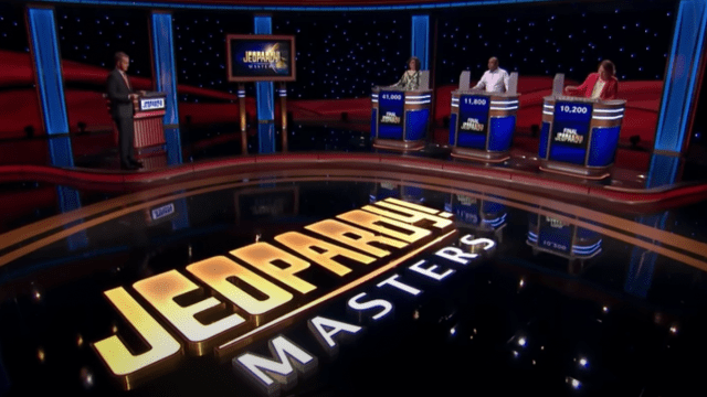 View of the stage, host, and contestants on Jeopardy! Masters season 2