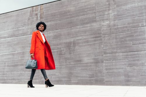 fashionable woman walking down the street