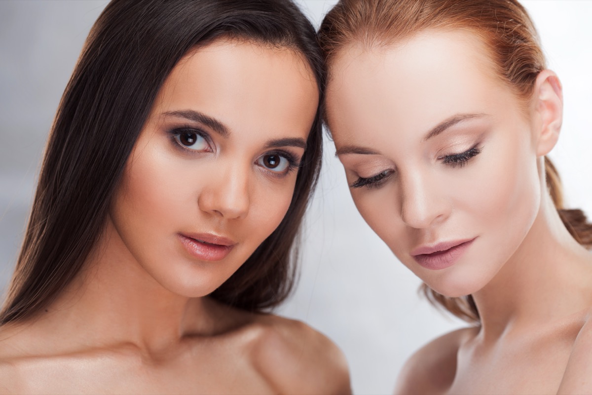 Two young women with warm and cool skin undertones