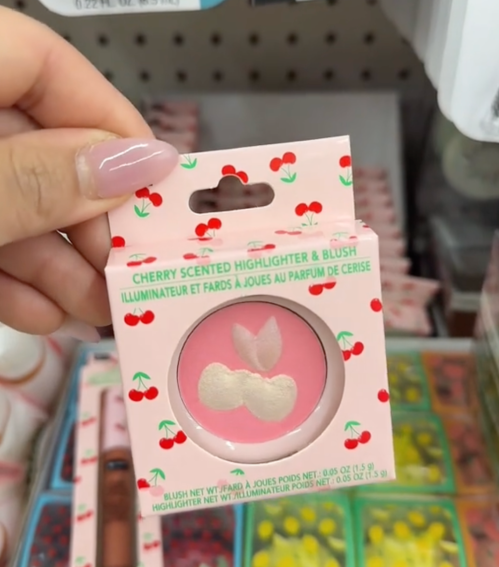 shopper holding blush at Dollar Tree