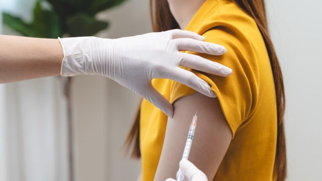 woman getting vaccinated