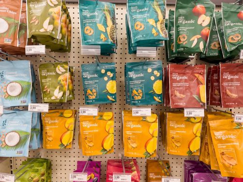 Packs of dried fruit by Good and Gather brand on display at Target