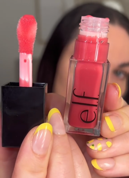 TikToker Kristyn Hoffman holding up makeup