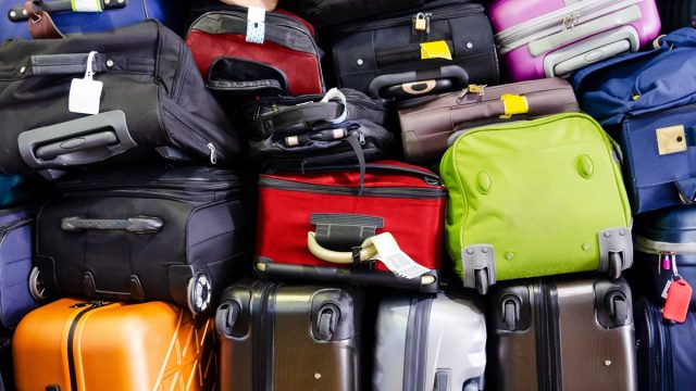 stack of multicolored luggage