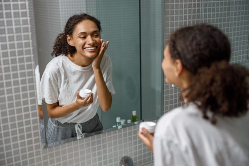 woman doing skincare routine