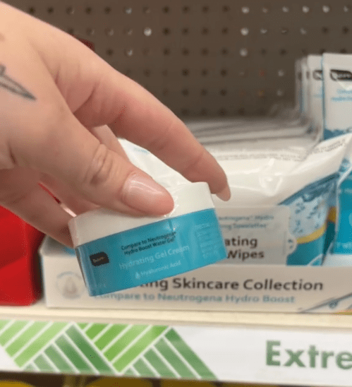 Still from a video of a shopper holding a jar of face cream at Dollar Tree