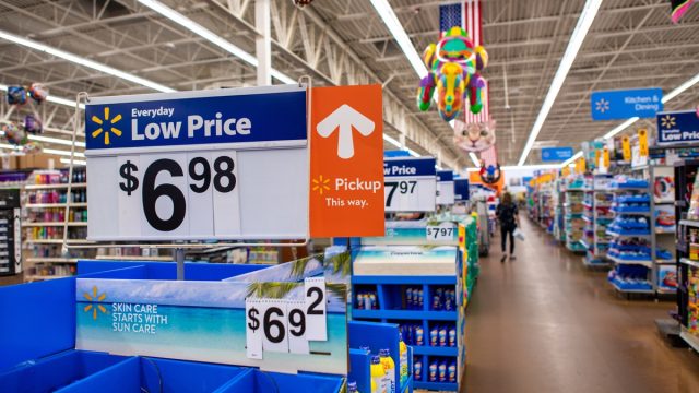 sign with Walmart prices in Walmart store
