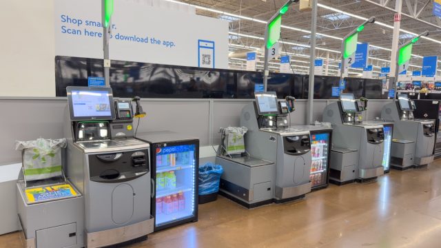 Self Checkout registers inside Walmart Supercenter store.