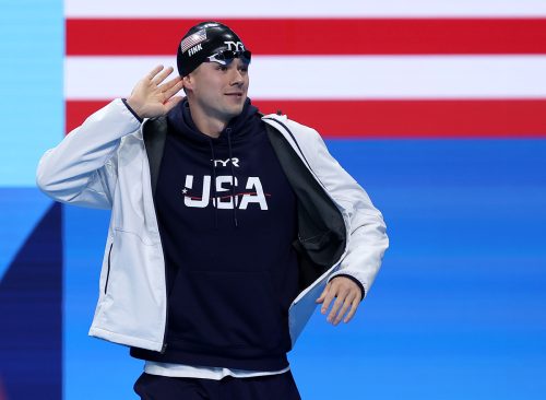 Nic Fink of Team United States gestures as he walks out ahead of the Men’s 100m Breaststroke Final on day two of the Olympic Games Paris 2024 at Paris La Defense Arena on July 28, 2024 in Nanterre, France.