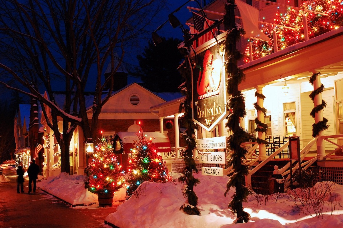 Night time view of the Red Lion Inn in Stockbridge, Massachusetts, decorated for Christmas with snow