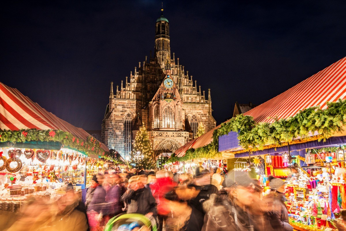 Huge crowd of people moving over Nuremberg's world-famous christmas market