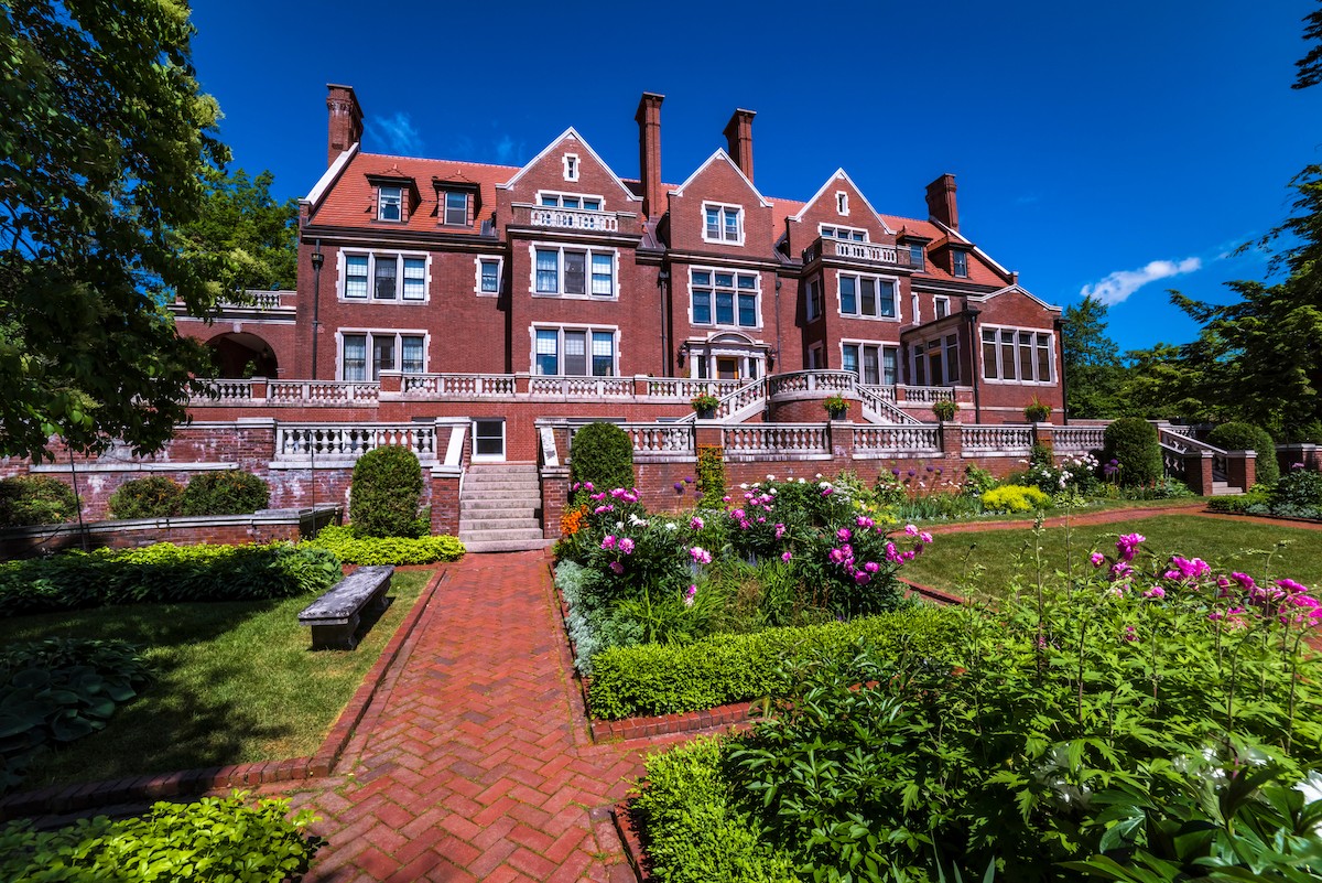 The famous Glensheen Mansion in Duluth, Minnesota and its summer garden display.