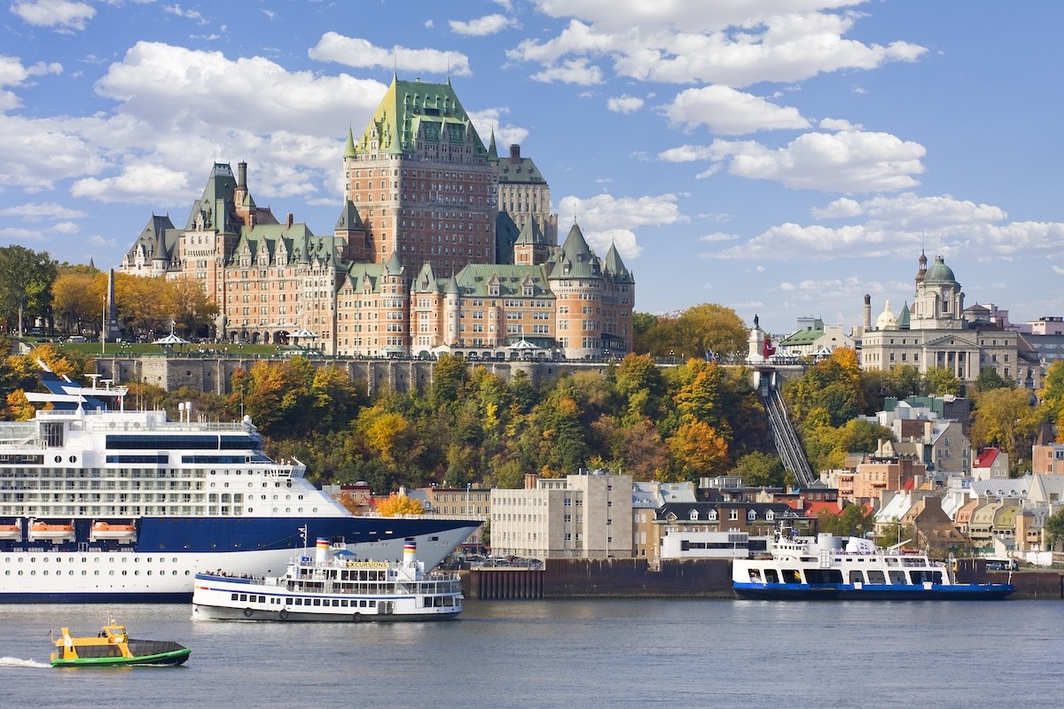 St. Lawrence River in Canada cruise ships and boats in front of buildings