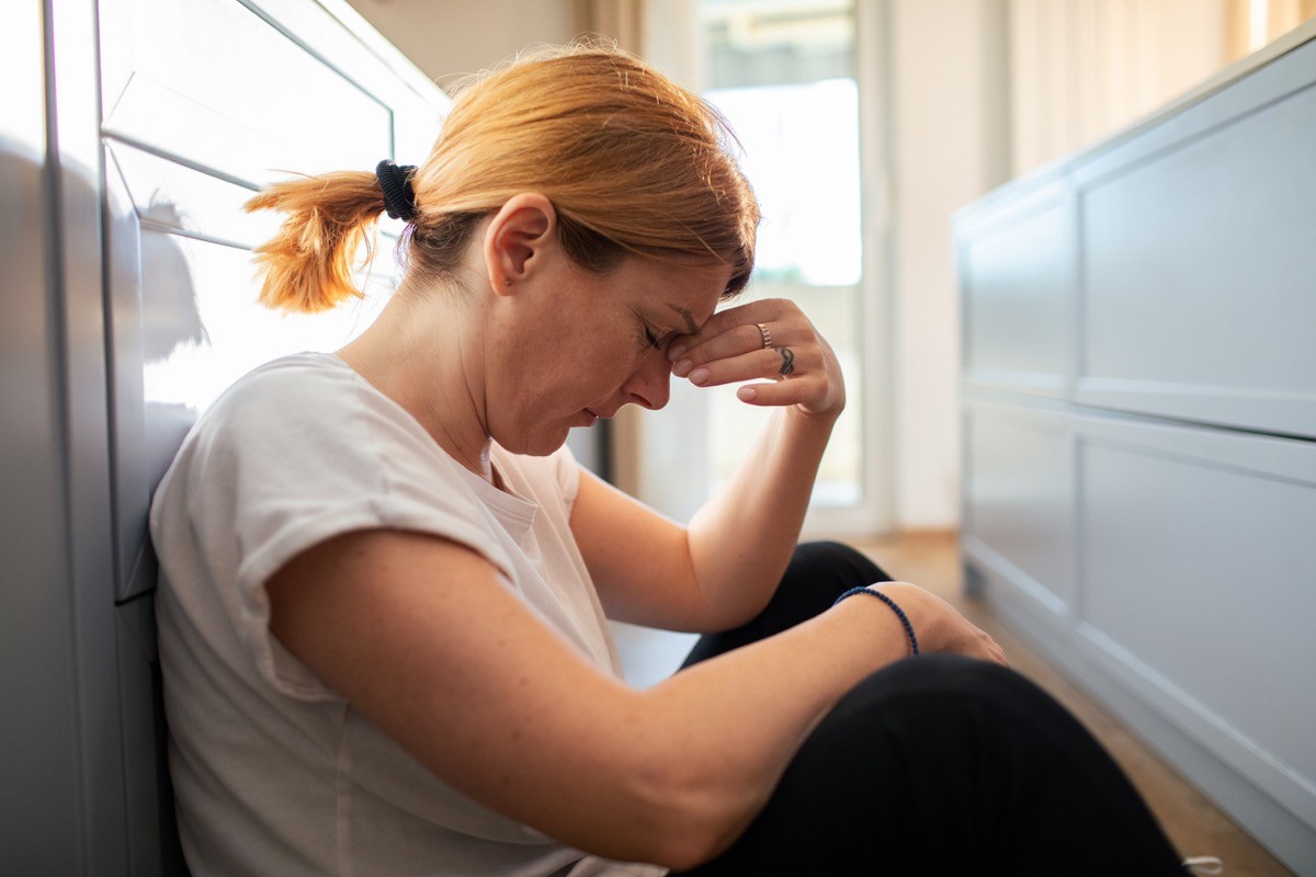 stressed-woman-sitting-on-the-floor
