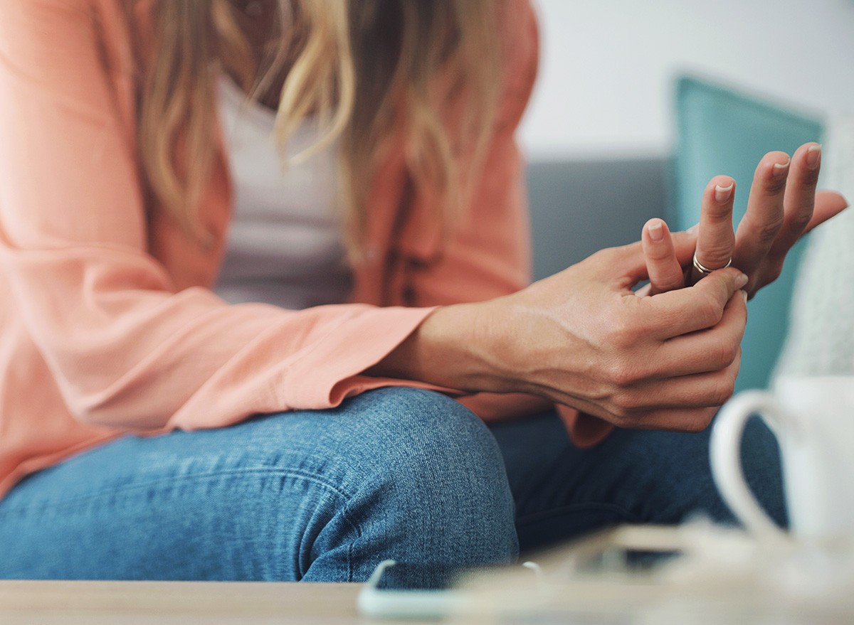 woman-with-anxiety-wrings-her-hands