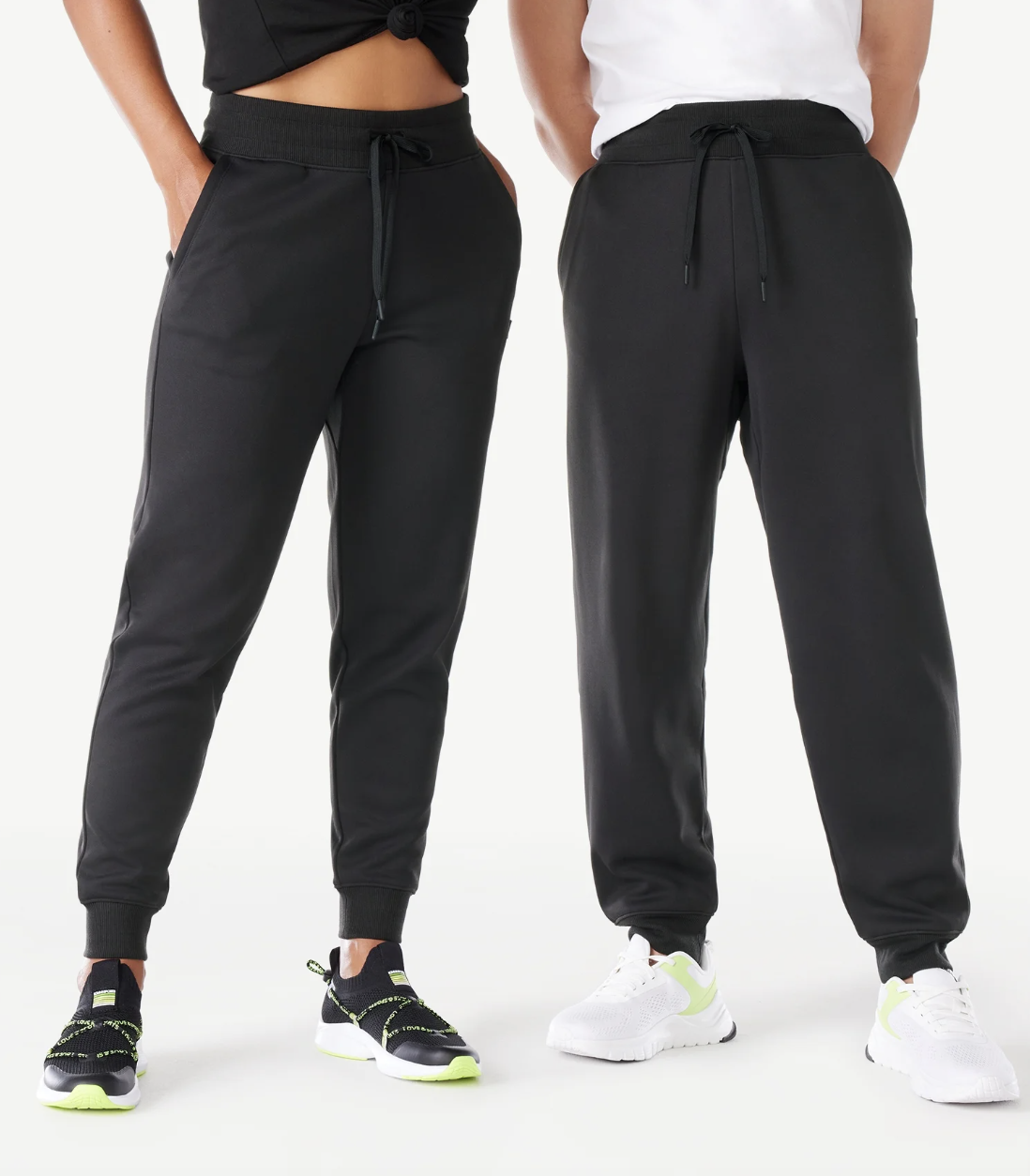waist-down view of two models wearing gray sweatpants from Walmart's Love & Sports line