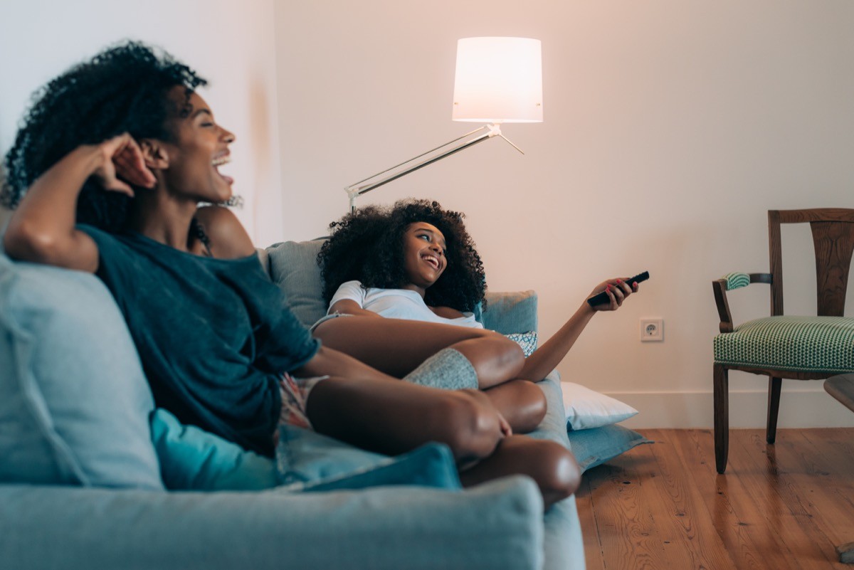 two women watching tv