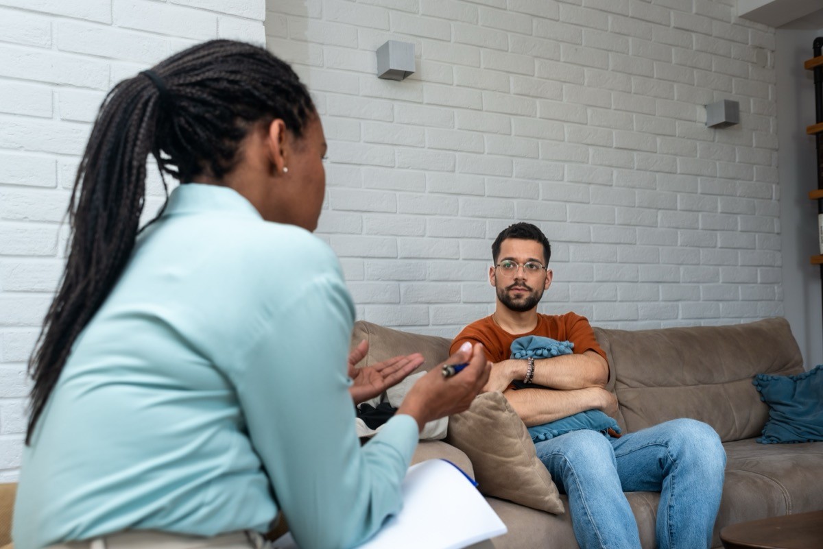 man talking to a therapist