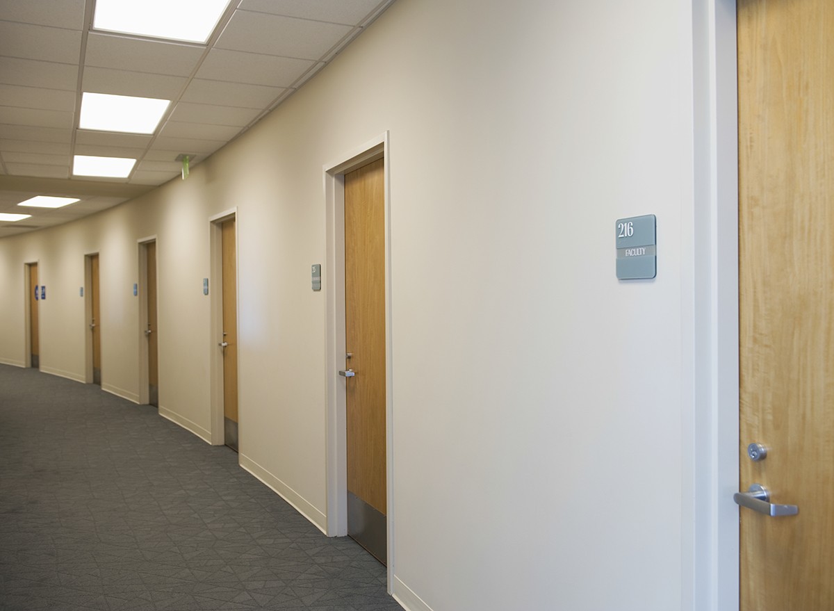 Closed office doors in a hallway in an office