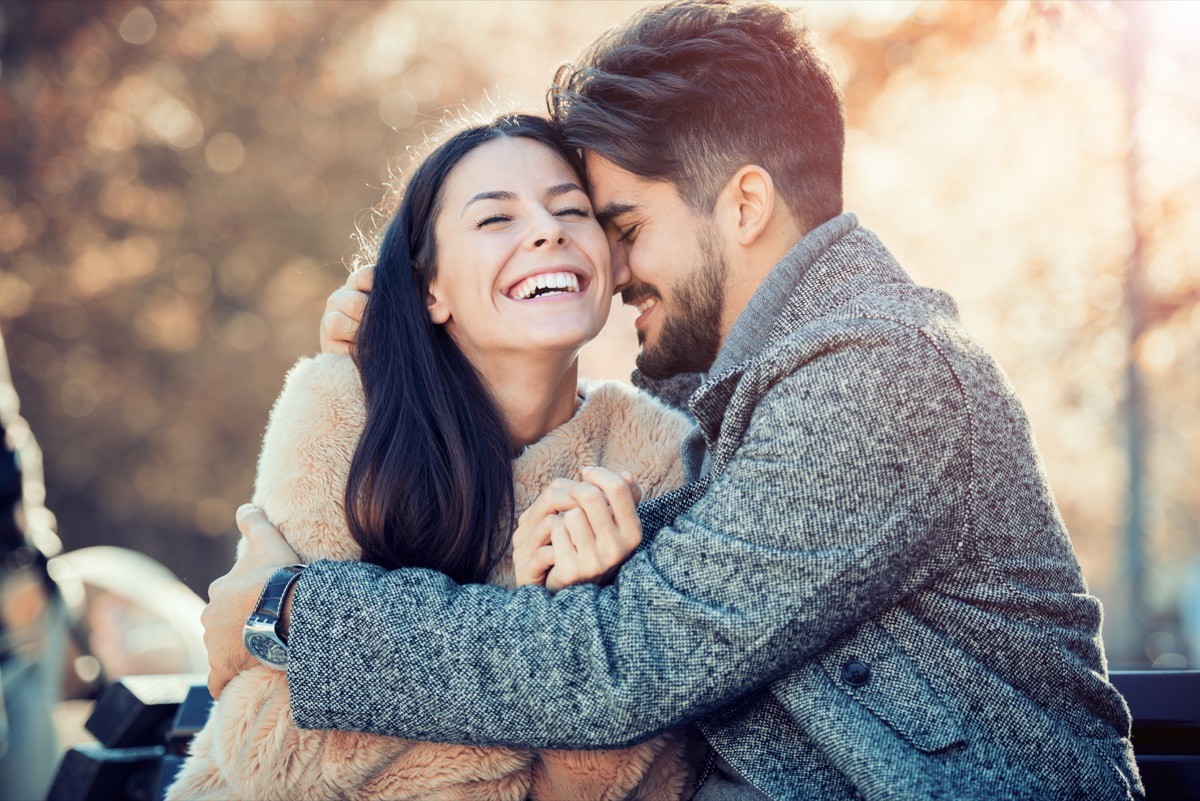Happy couple laughing together
