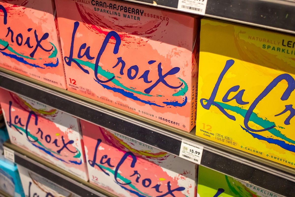 Boxes of La Croix on a shelf in a store