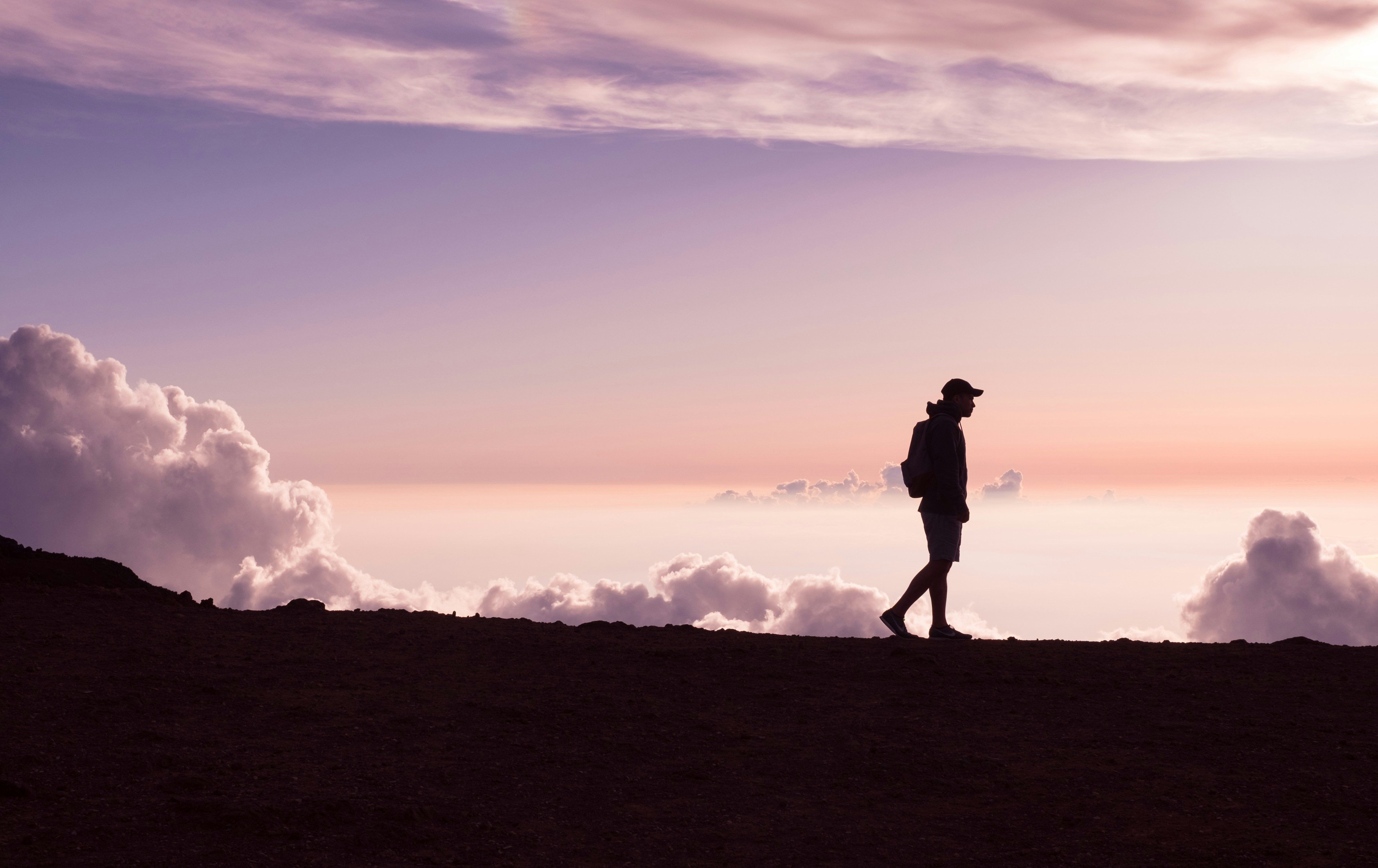 person going for a walk amidst the clouds