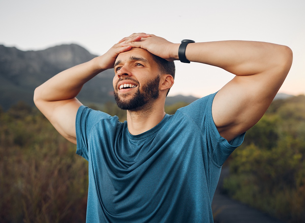 A man is sweaty after a hard workout outside