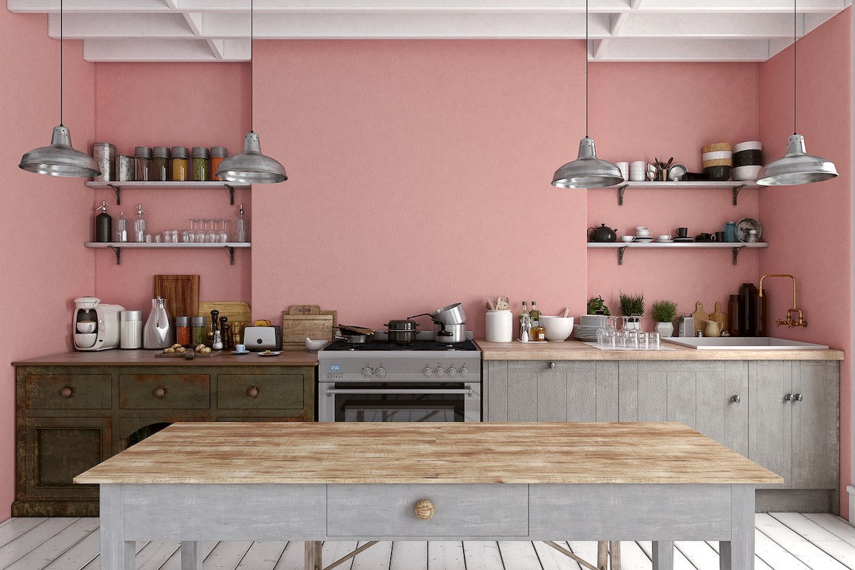 Kitchen with pink walls and gray cabinets