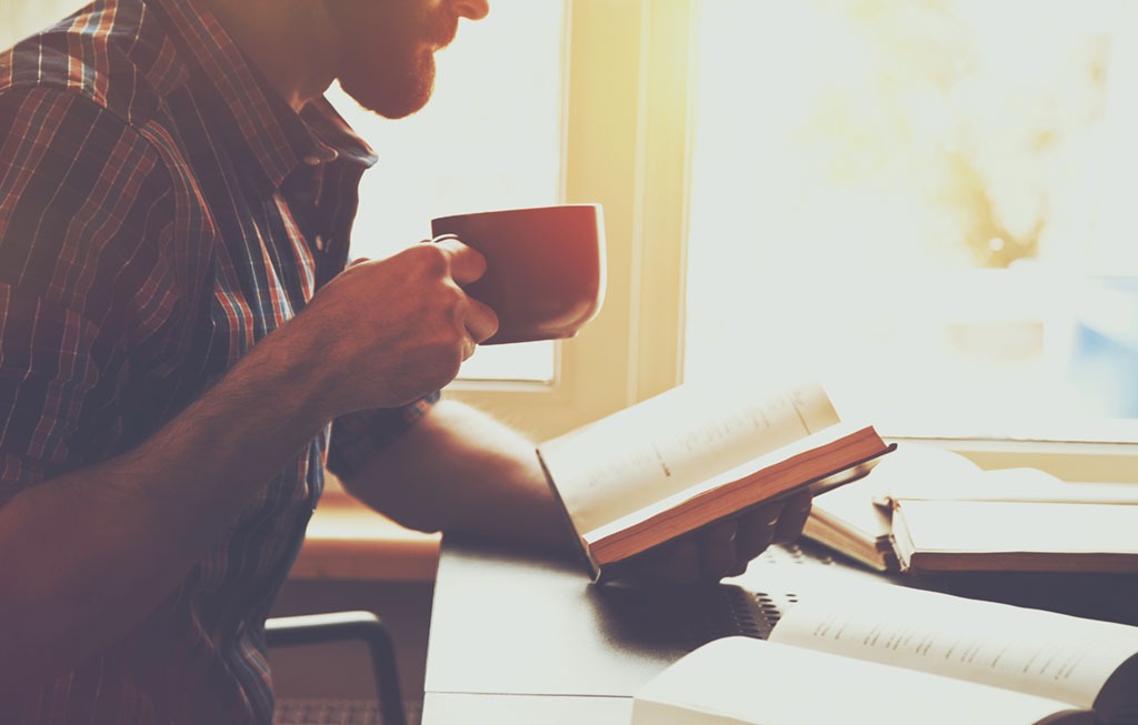 man reading book 